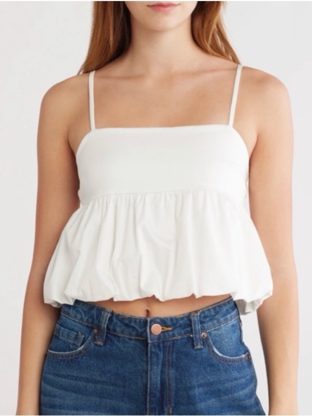 Abound Bubble Peplum Crop Top a square neckline and spaghetti straps.
Size XL